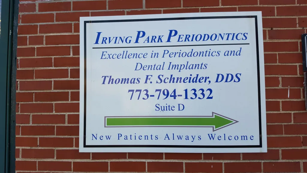 A photo of the sign in front of the practice, Irving Park Periodontics
