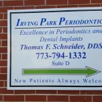 A photo of the sign in front of the practice, Irving Park Periodontics