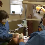 A photo of doctors completing a procedure